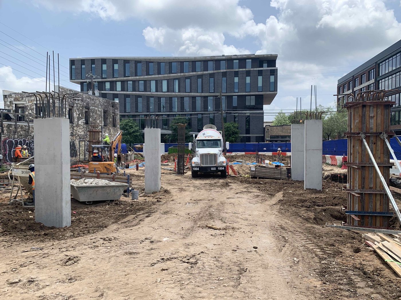 New concrete columns and site work at the 6th and Chicon hotel site, downtown Austin